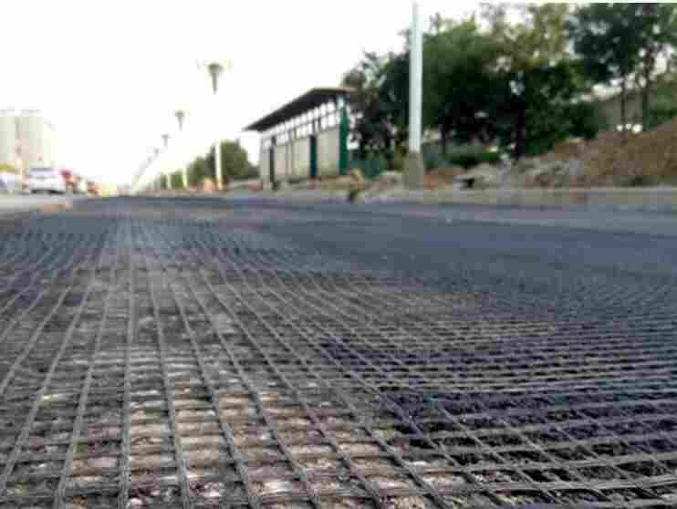 昆明寻甸玻璃纤维土工格栅昆明寻甸—玻纤土工格栅昆明寻甸沥青路面用波纤格栅—玻纤格栅