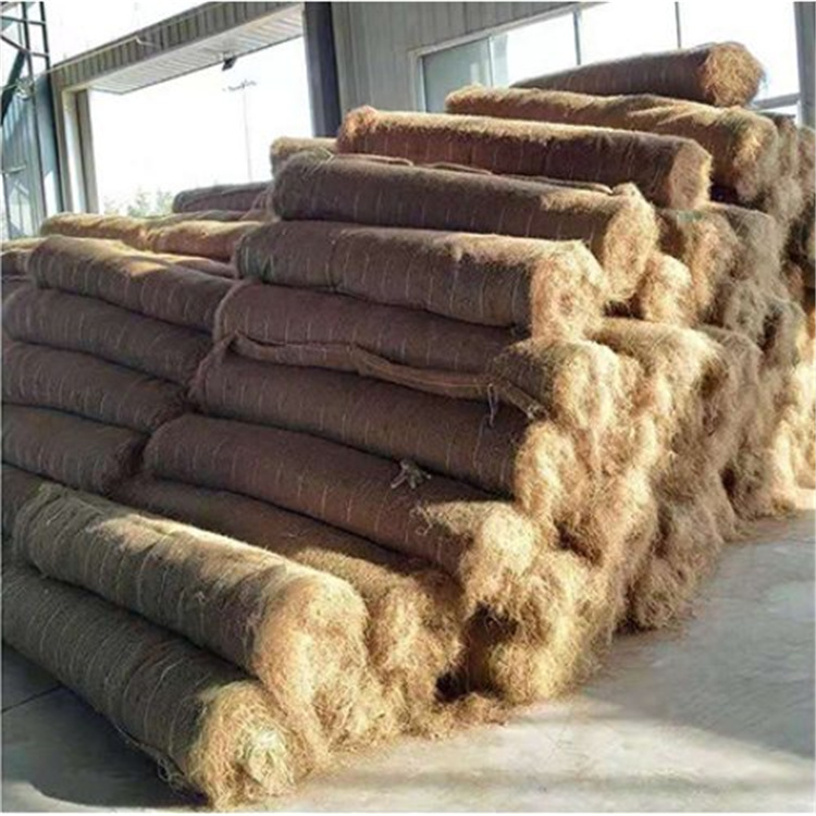 固土绿化生态椰丝毯 锦州加筋抗冲生物毯 带草种植物纤维毯