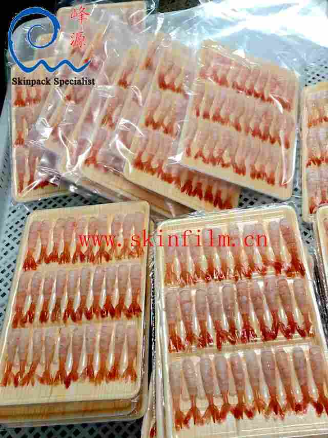 390贴体包装机（TB390贴体包装机 390贴体机）虾贴体包装实例：